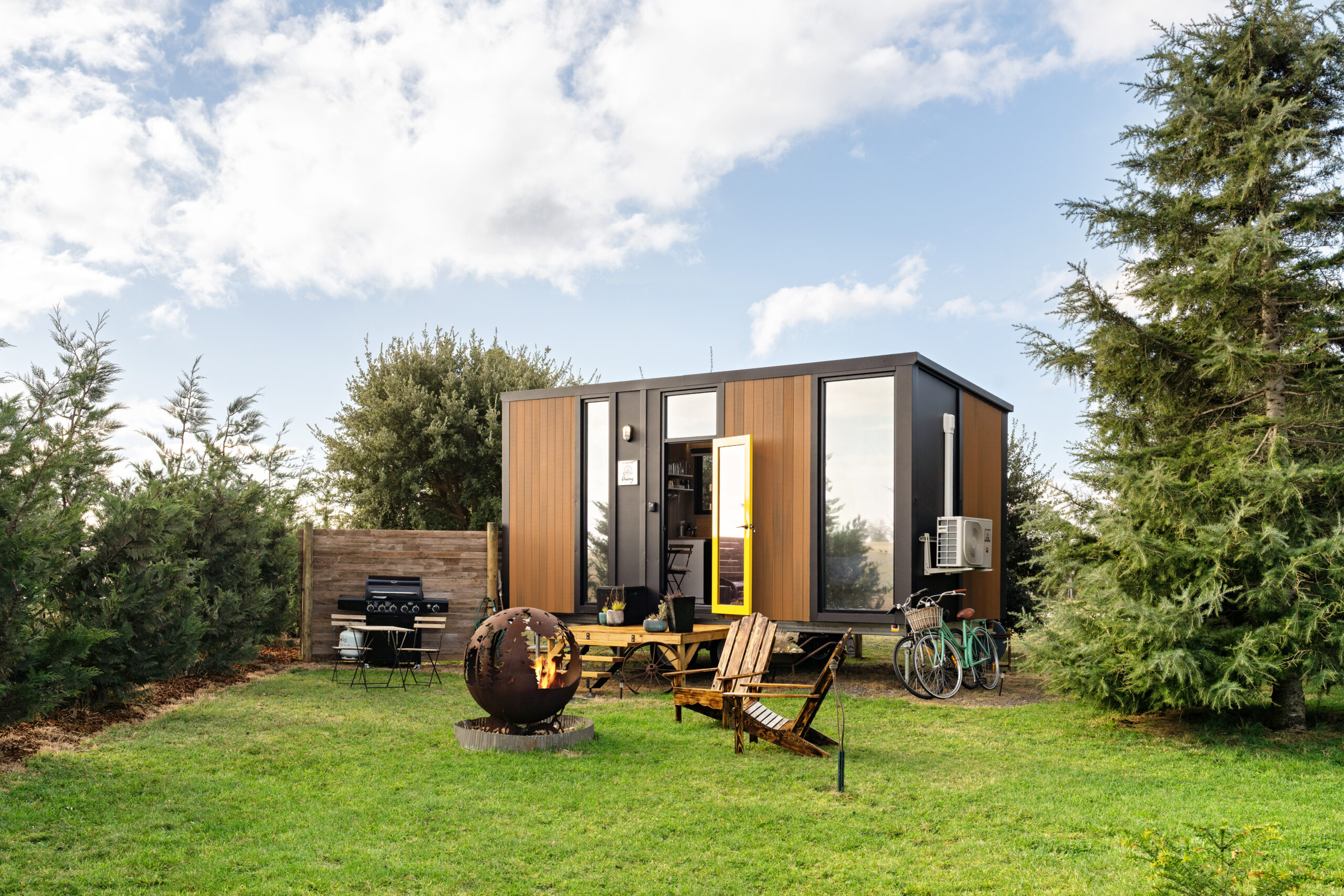 The Tale of Big Tiny: Realising an Expansive Vision through Compact Designs